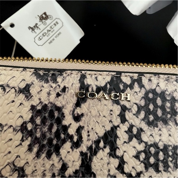 Coach Python Embossed Long Zip Wallet NWT 
MSRP $525 shown in receipt - Picture 3 of 11
